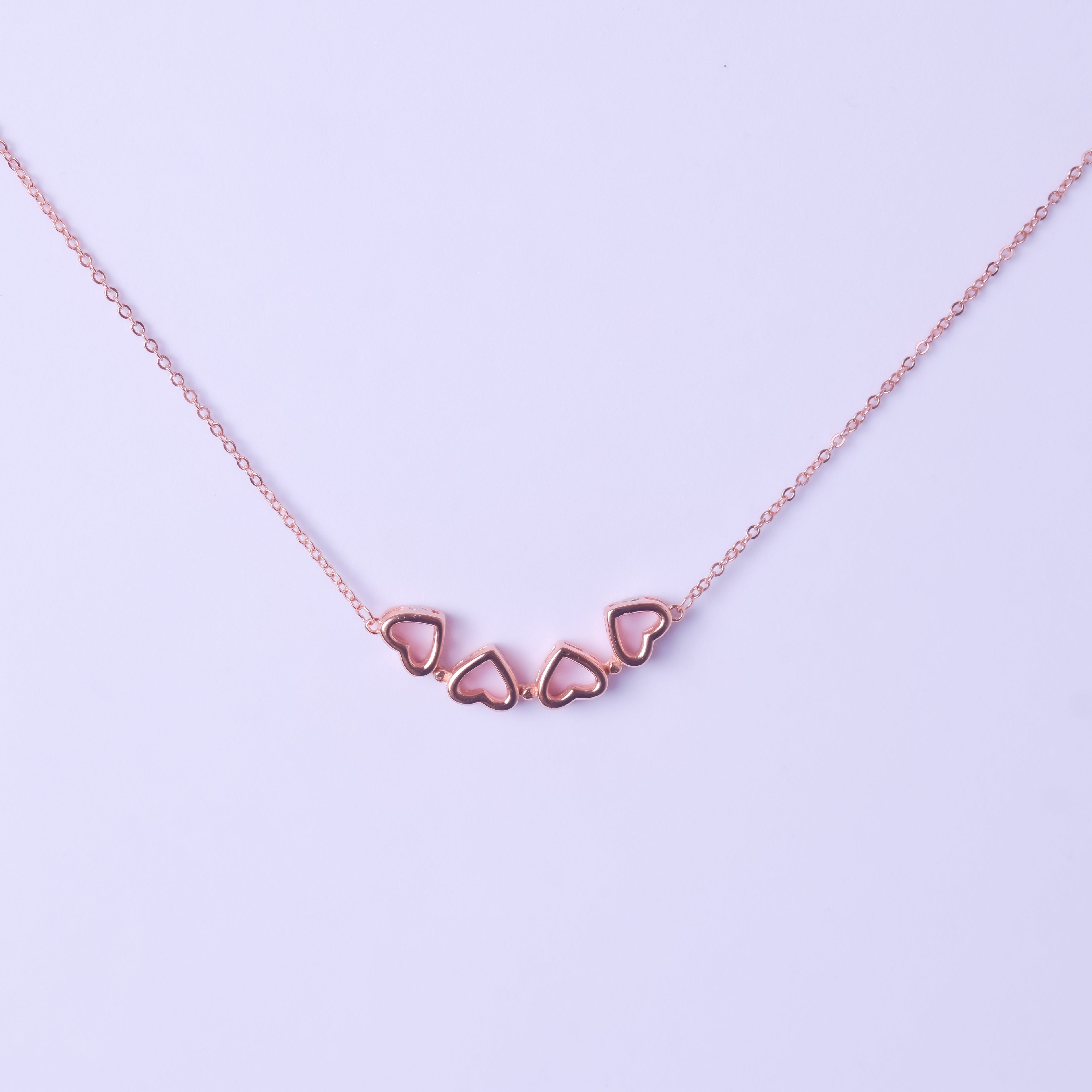 Silver And Rose Gold Four Love Hearts Necklace